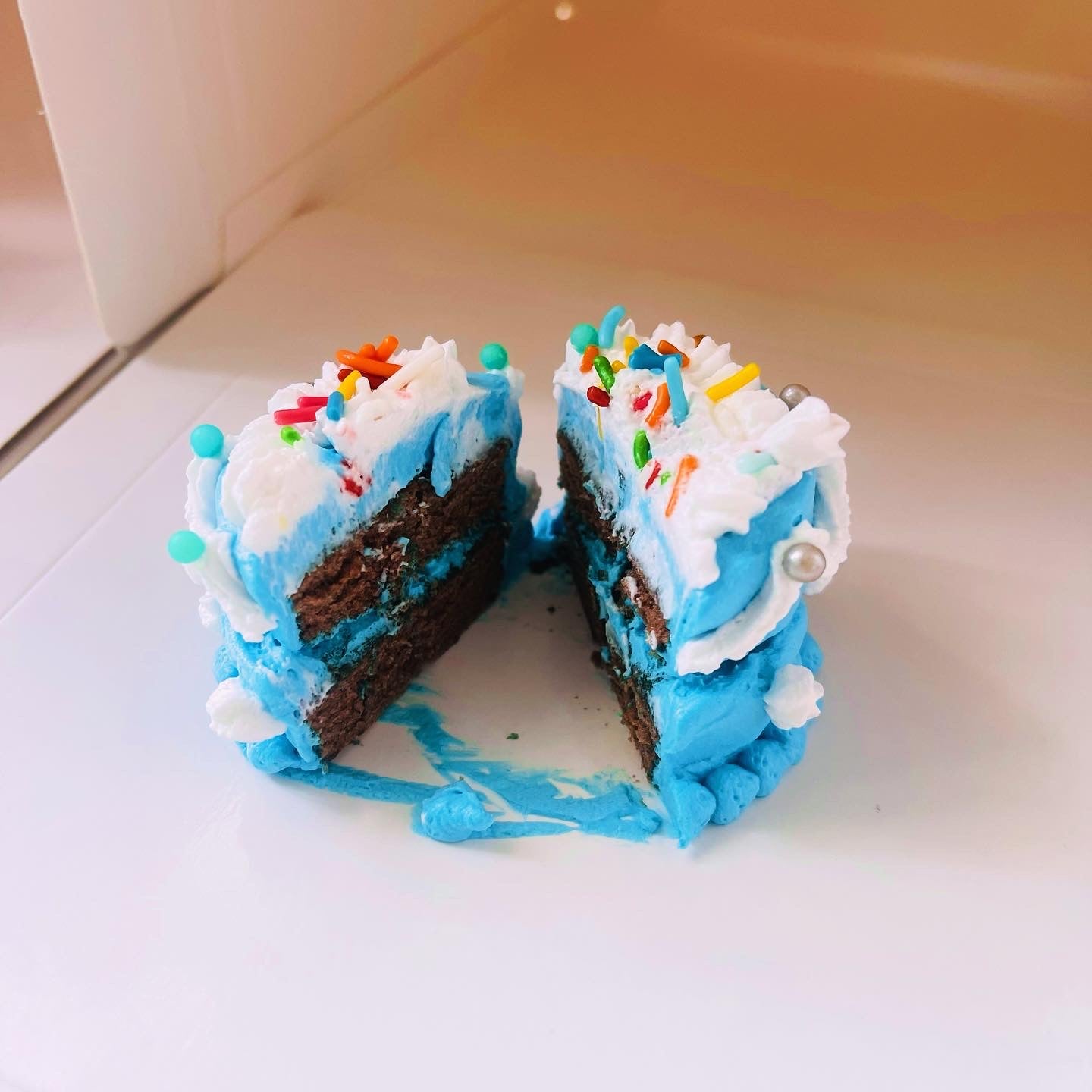 April fool’s day mini cake in a big box